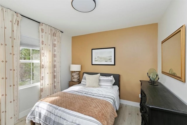 bedroom featuring light hardwood / wood-style floors