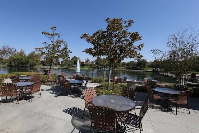 view of patio featuring a water view