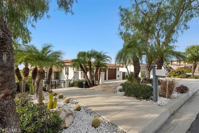 view of front of property with a garage