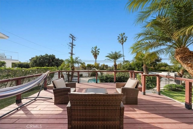 deck with an outdoor hangout area