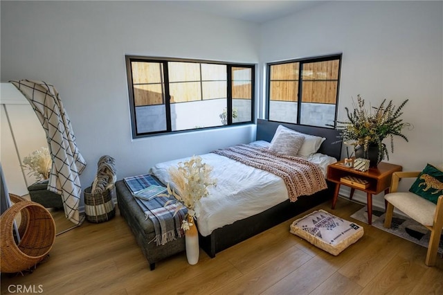 bedroom featuring hardwood / wood-style flooring