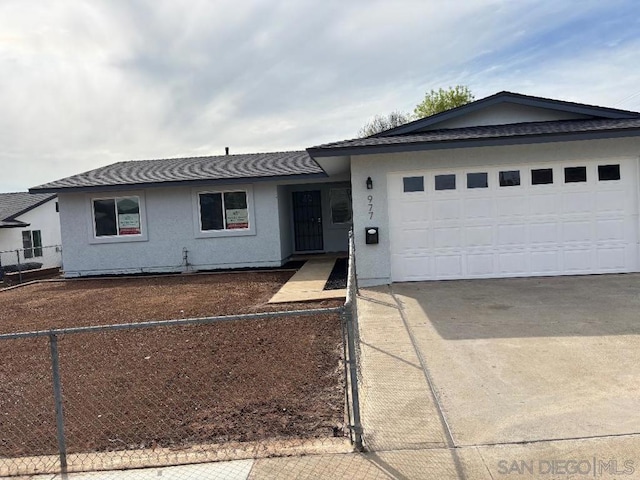 single story home with a garage