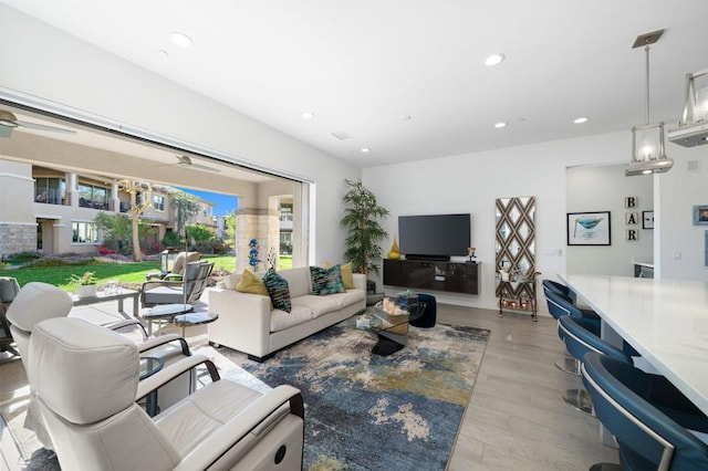 living room with light hardwood / wood-style floors