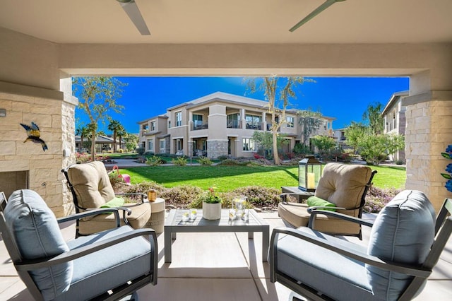 view of patio with ceiling fan and outdoor lounge area