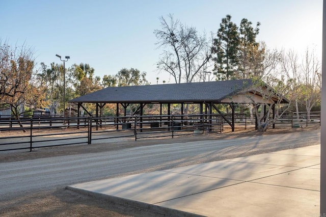 view of home's community with an outdoor structure