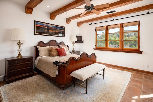 tiled bedroom with beamed ceiling and ceiling fan