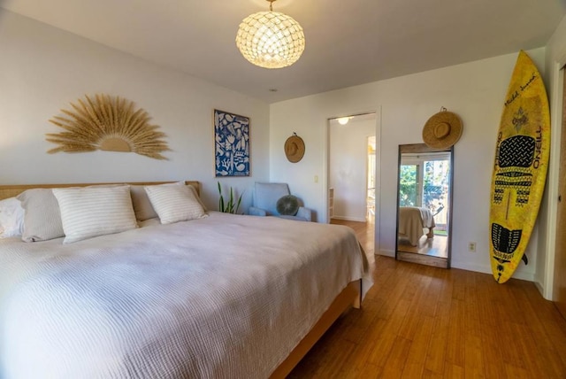 bedroom featuring hardwood / wood-style flooring