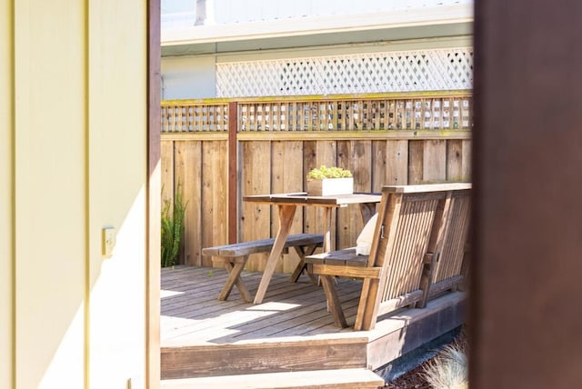 wooden balcony featuring a wooden deck