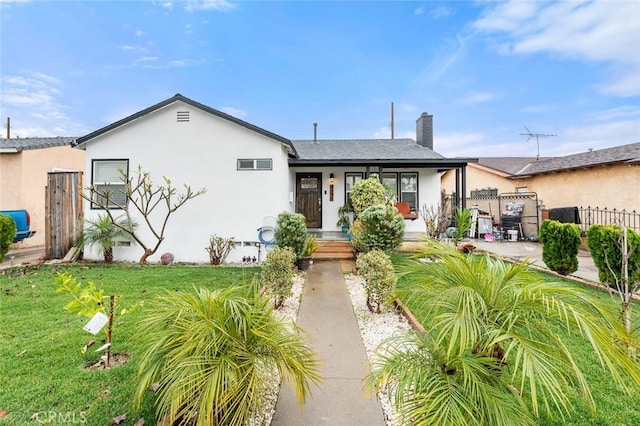 view of front of house with a front yard