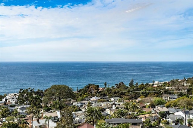 exterior space with a water view