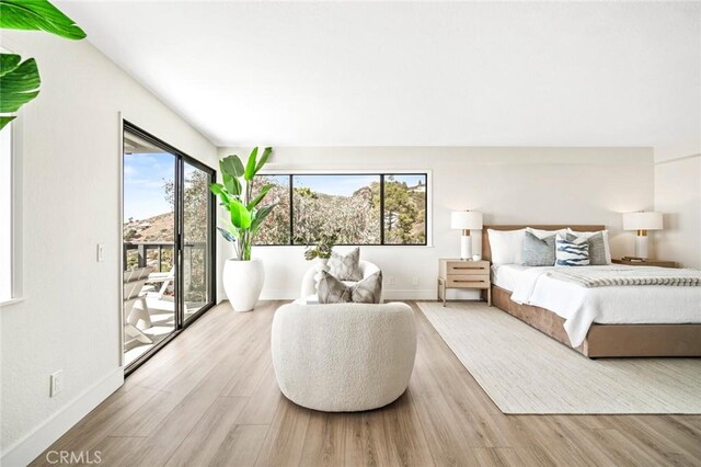 22332 Eagle Rock Way, Laguna Beach, CA 92651 - bedroom featuring access to outside and light wood-type flooring