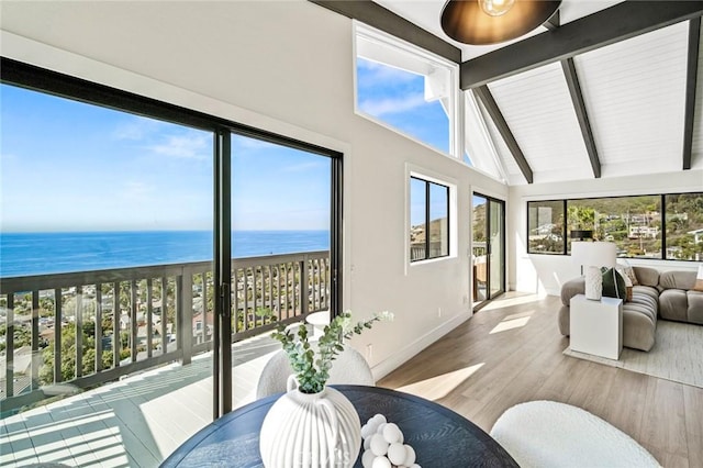 22332 Eagle Rock Way, Laguna Beach, CA 92651 - sunroom / solarium with beamed ceiling, a water view, high vaulted ceiling, and wood finished floors