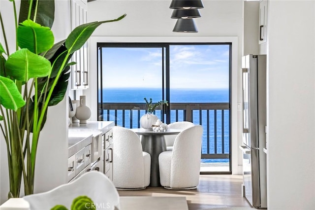 22332 Eagle Rock Way, Laguna Beach, CA 92651 - dining area with wood finished floors and a water view