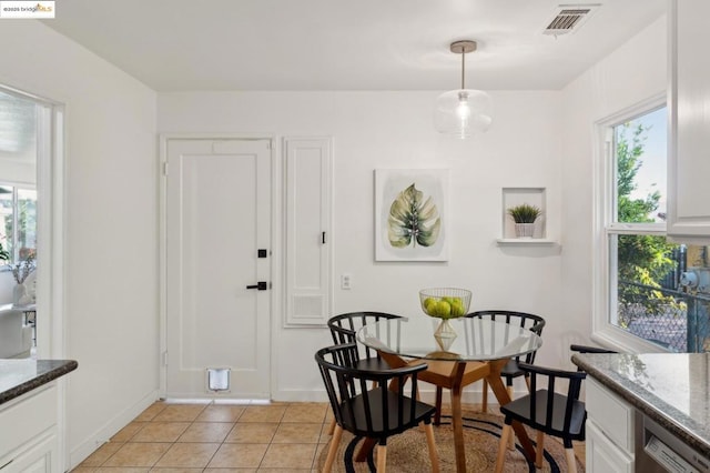 view of tiled dining space