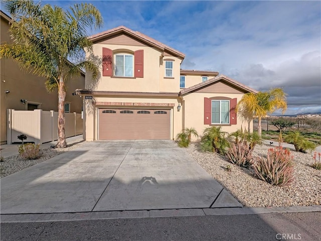 view of front of property with a garage