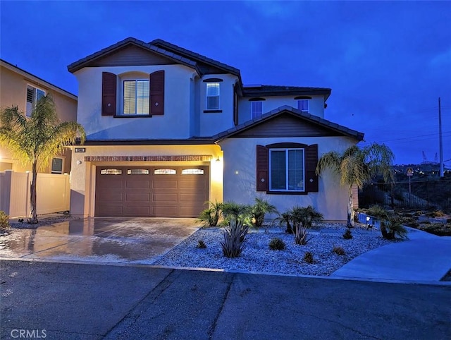 front facade with a garage