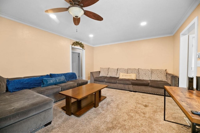 carpeted living room featuring crown molding and ceiling fan