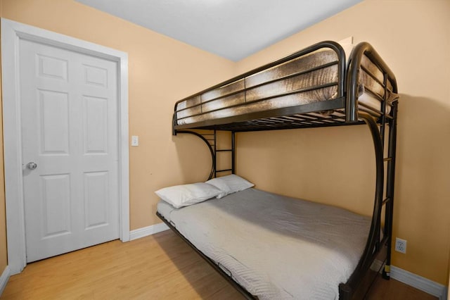 bedroom with light wood-type flooring