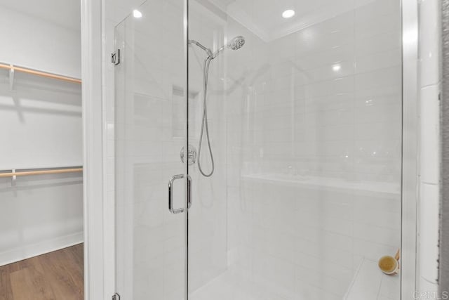 16750 Coyote Bush Dr Unit 107, San Diego, CA 92127 - full bath featuring recessed lighting, a walk in closet, a stall shower, and wood finished floors