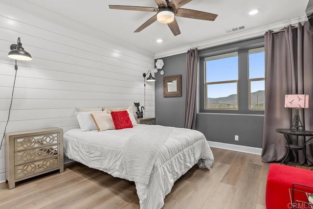 16750 Coyote Bush Dr Unit 107, San Diego, CA 92127 - bedroom featuring recessed lighting, ornamental molding, baseboards, visible vents, and wood finished floors