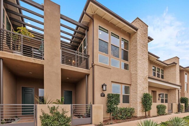 16750 Coyote Bush Dr Unit 107, San Diego, CA 92127 - view of property with fence