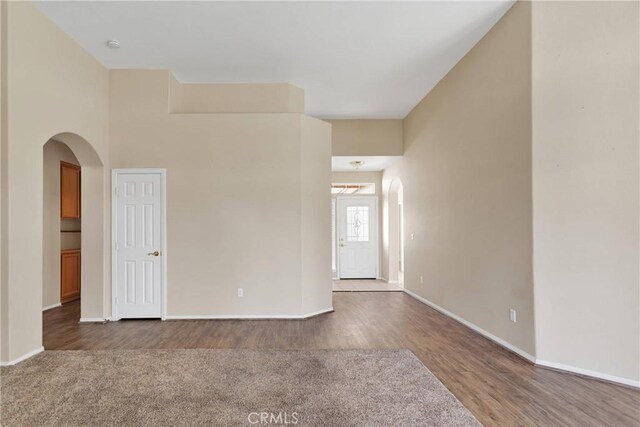 spare room with hardwood / wood-style floors