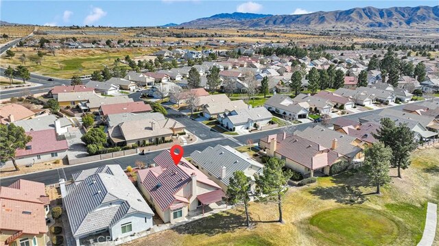 drone / aerial view featuring a mountain view