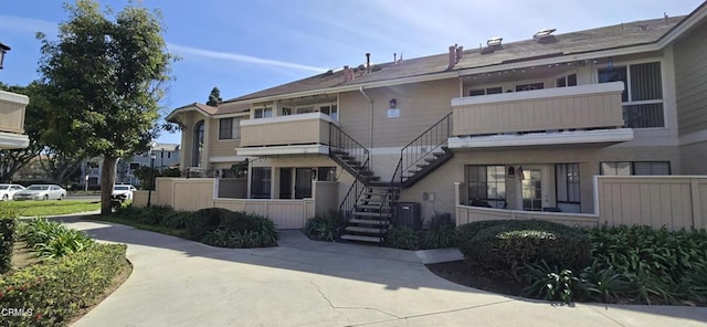 view of building exterior with cooling unit