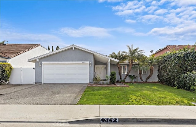 single story home with a garage and a front yard