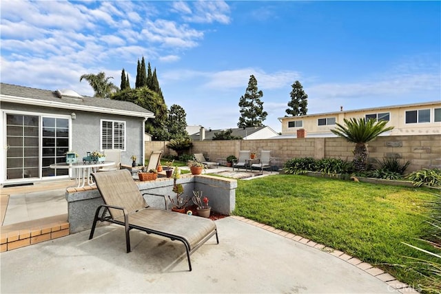 view of patio / terrace featuring an outdoor fire pit