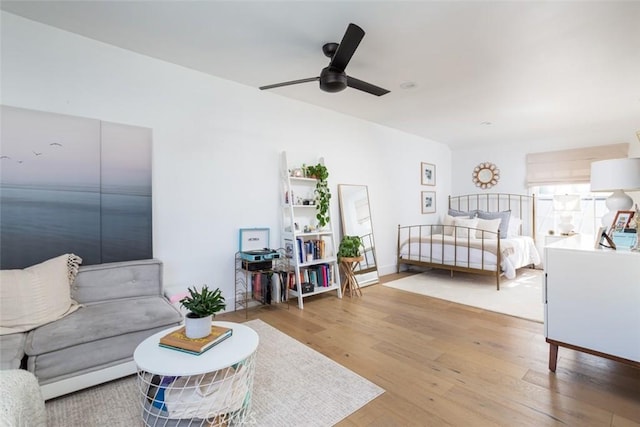 bedroom featuring wood finished floors and a ceiling fan