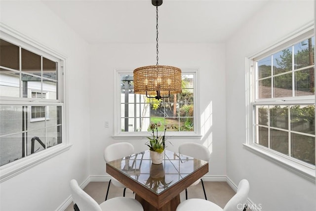 dining room featuring a notable chandelier