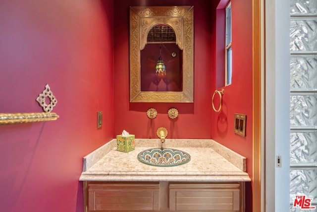 bathroom featuring vanity and plenty of natural light