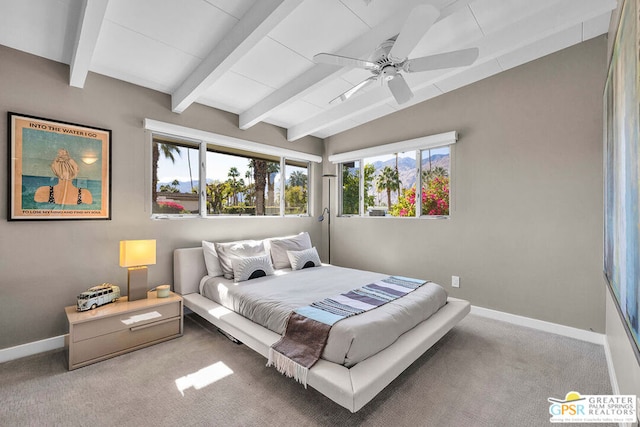 carpeted bedroom featuring vaulted ceiling with beams and ceiling fan