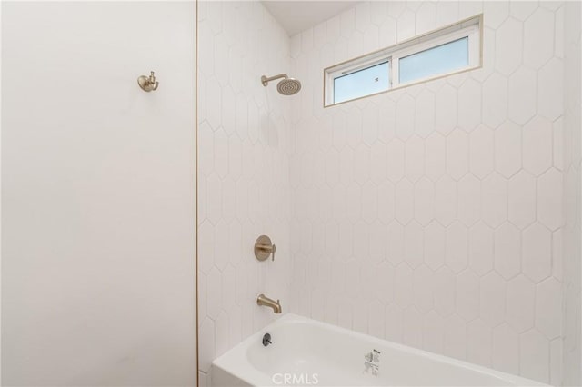 bathroom with shower / bath combination