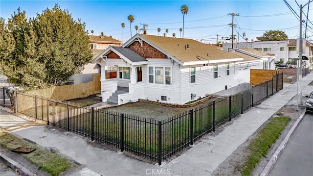 view of front facade with a fenced front yard