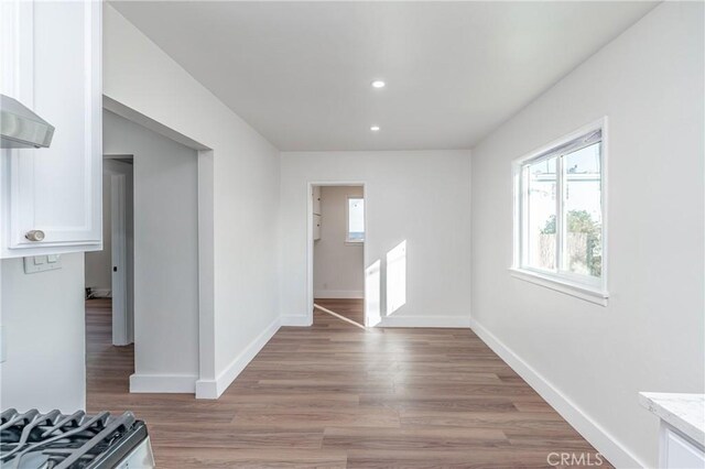 spare room with light wood-type flooring