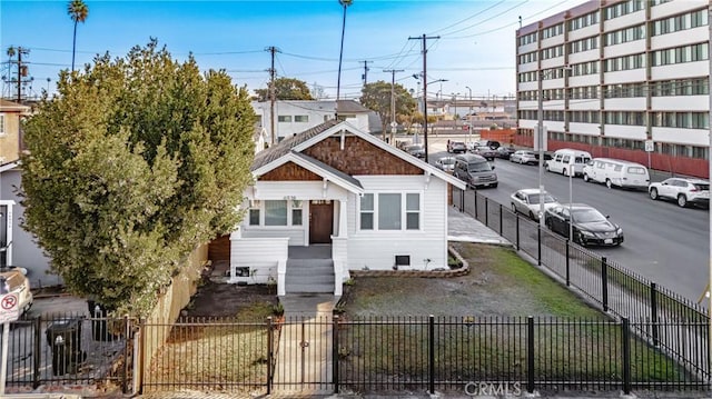 view of front of home with a fenced front yard