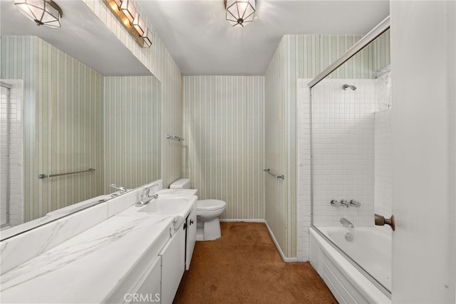 full bathroom with vanity, toilet, and tiled shower / bath combo