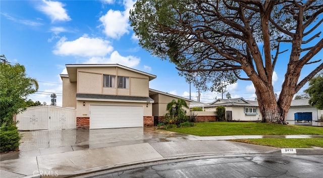 view of front of house with a garage and a front yard