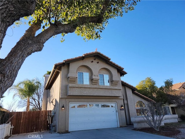 view of front of property with a garage