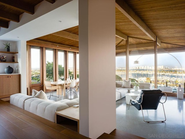 living room featuring wood ceiling and lofted ceiling with beams