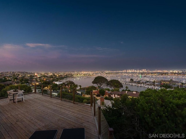 deck at dusk with a water view