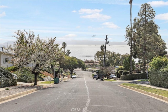 view of street with a water view