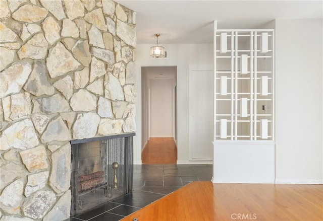 interior space featuring dark hardwood / wood-style floors and a fireplace