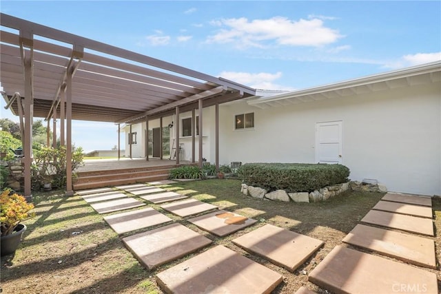 view of patio featuring a pergola