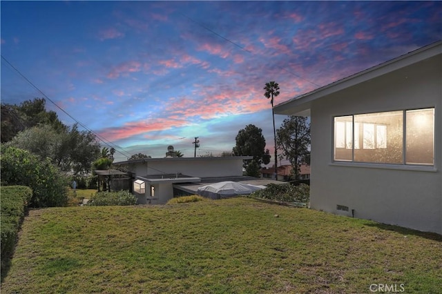 exterior space featuring a lawn