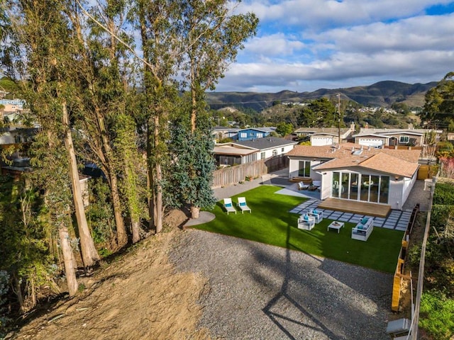 birds eye view of property featuring a mountain view