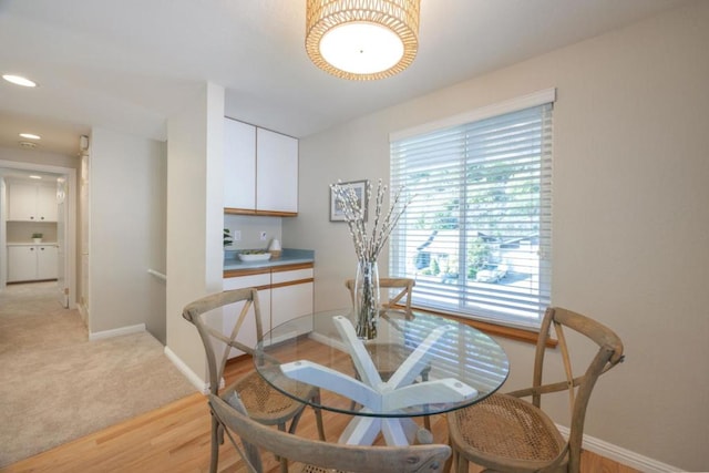 dining room featuring light hardwood / wood-style floors