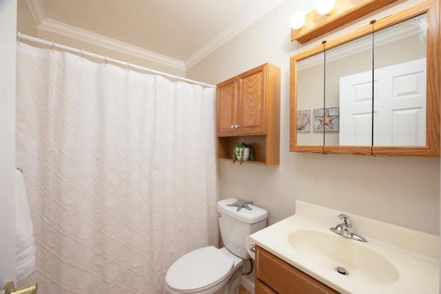 bathroom with ornamental molding, toilet, and vanity